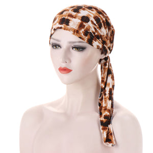 Curved Tail Turban Hat Flower