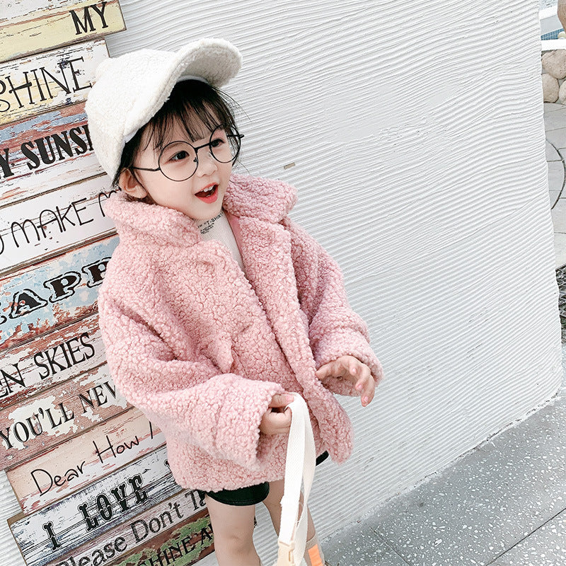 Girl with cotton wool and lamb wool coat