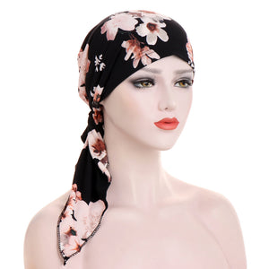 Curved Tail Turban Hat Flower